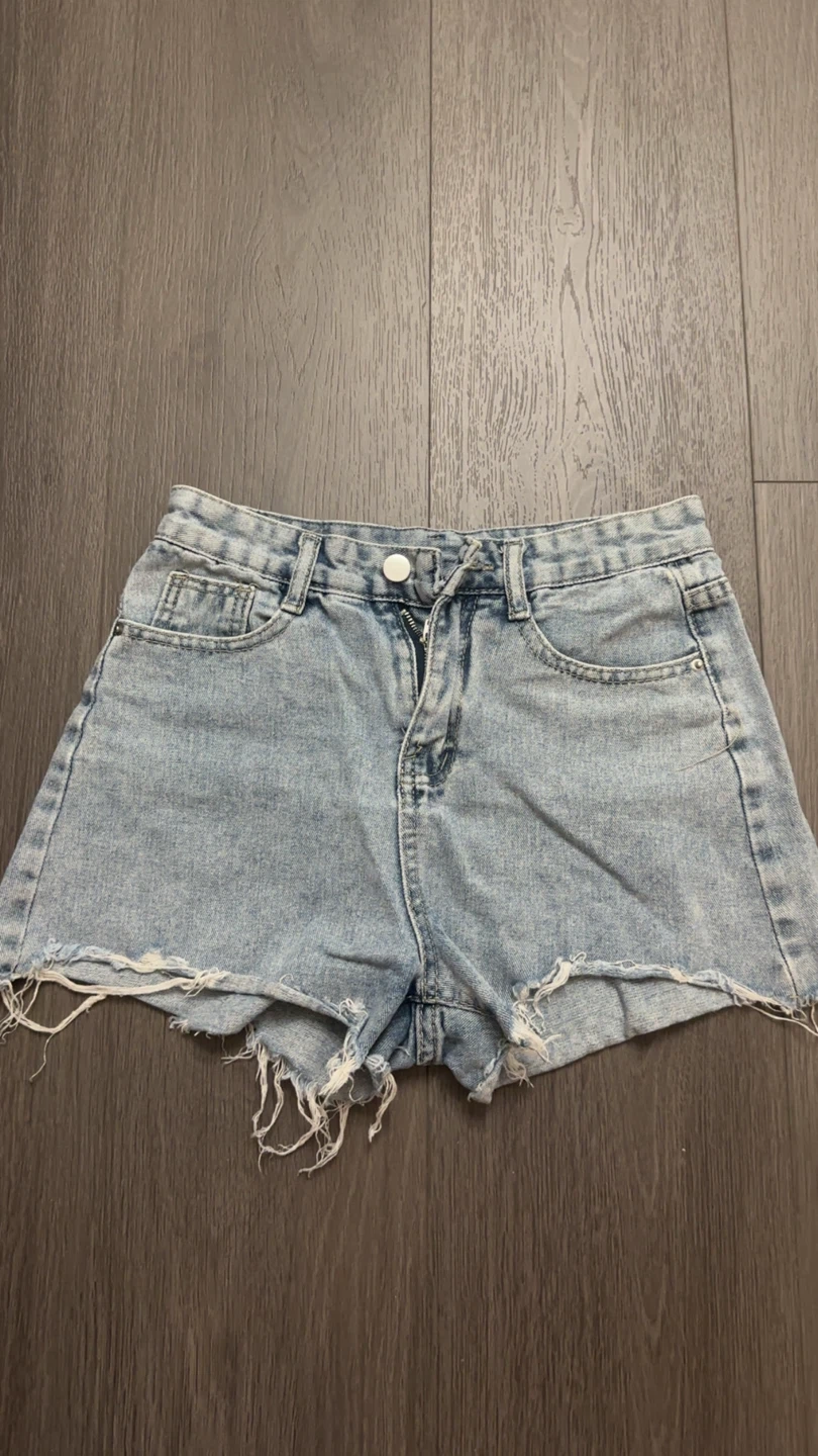 Distressed Light Wash Denim Shorts