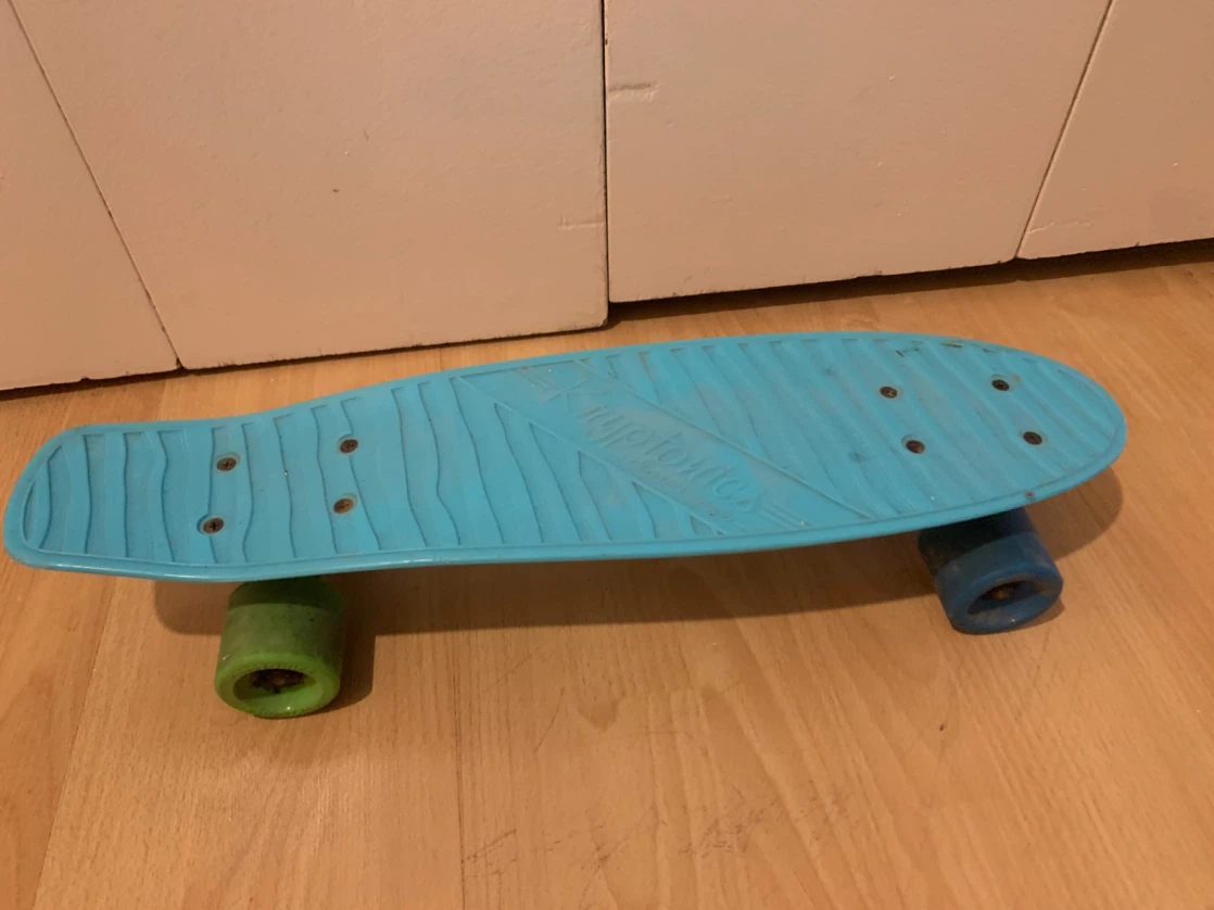 Kryptonics blue plastic skateboard