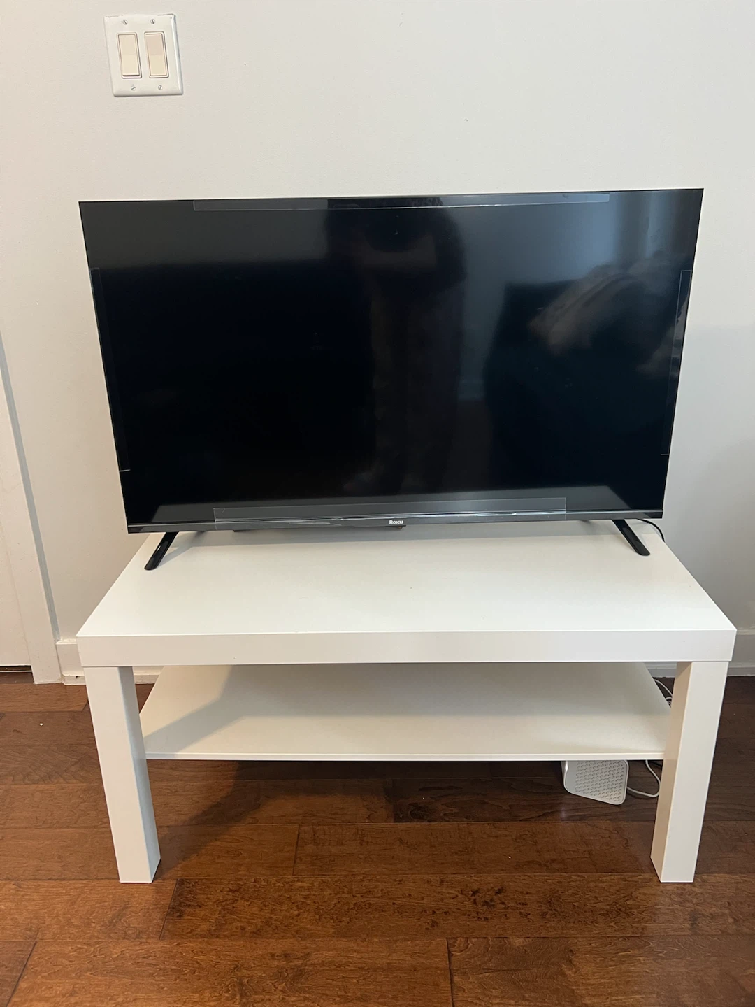 Roku TV with White TV Stand for Sale