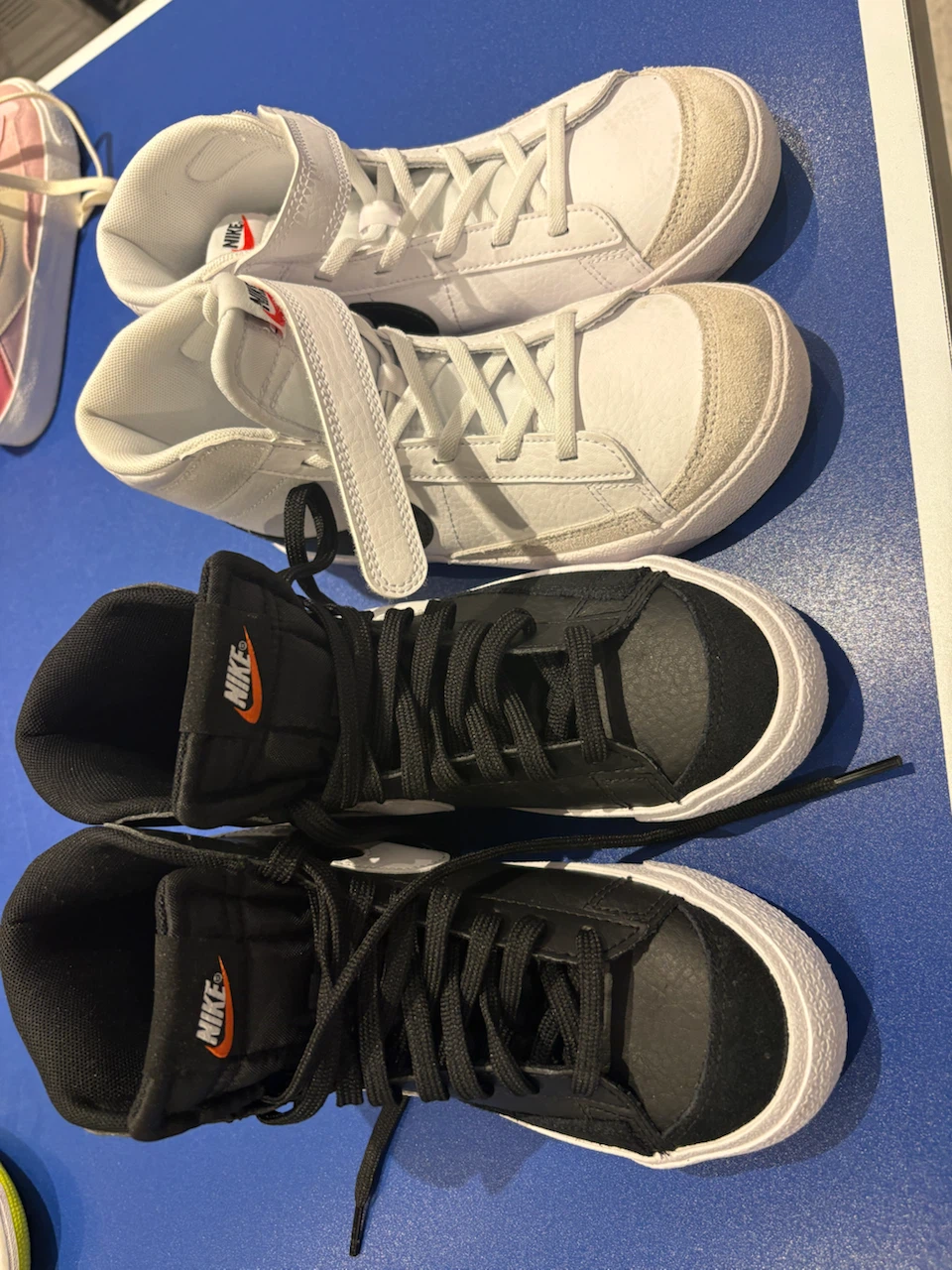 Two Pairs of Nike Blazer Mid Sneakers