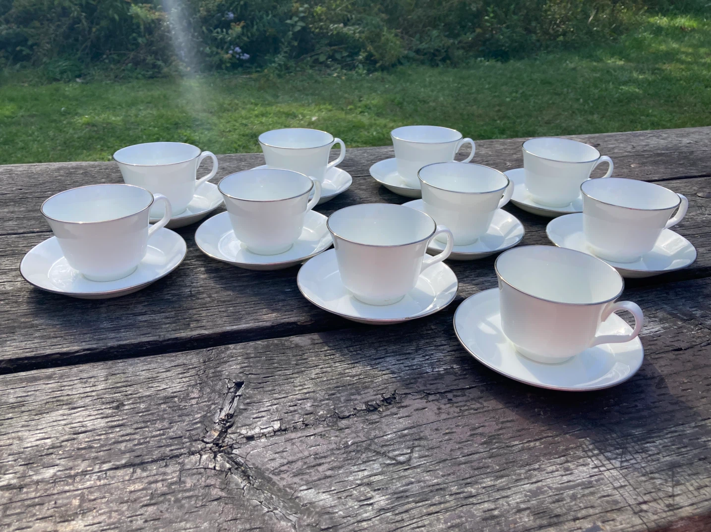 Set of 10 White Teacups with Saucers