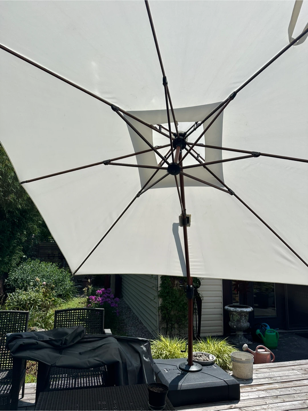 Purple leaf 10’ cantilever umbrella and base.