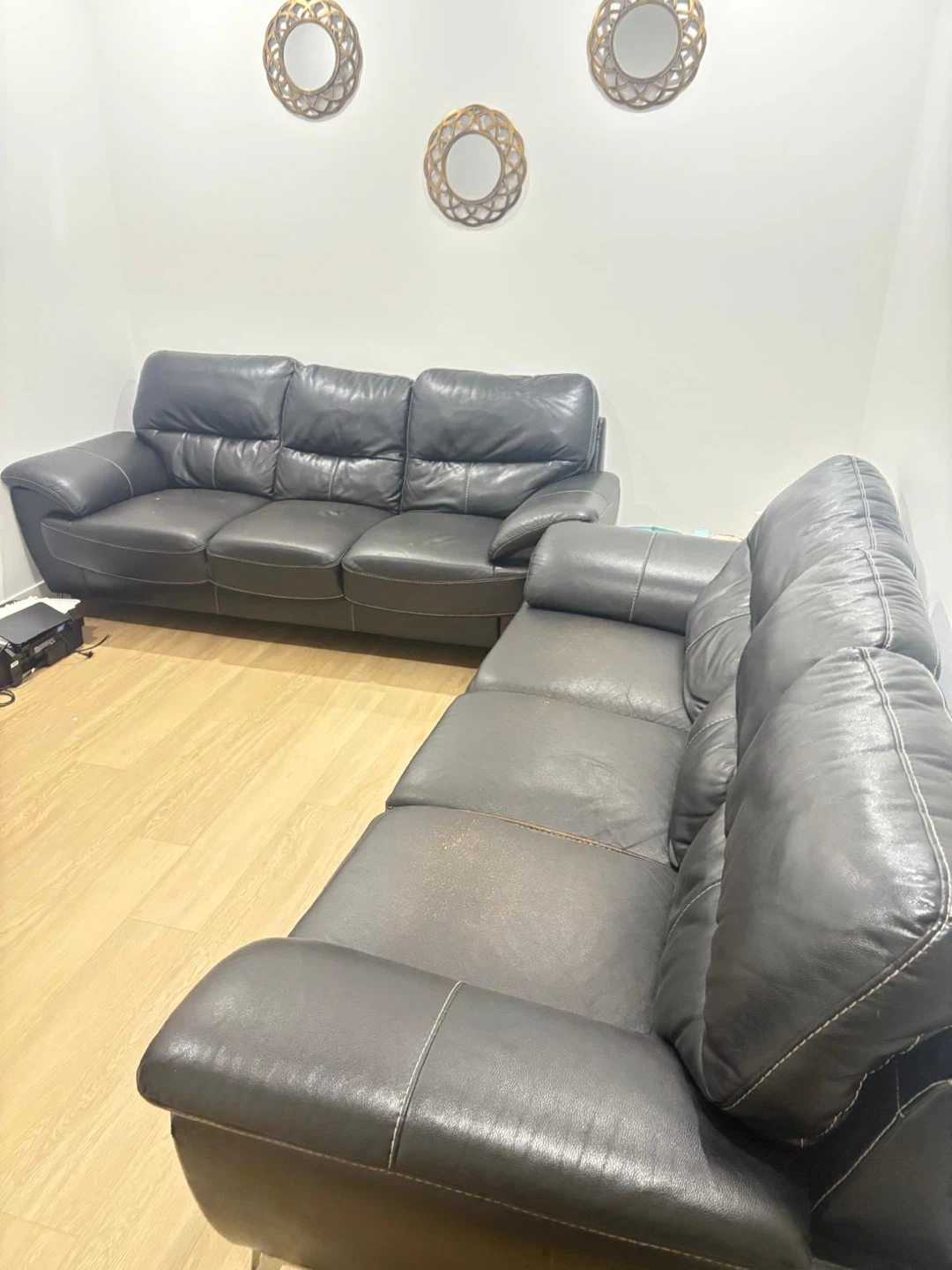 Two Black Leather Sofas
