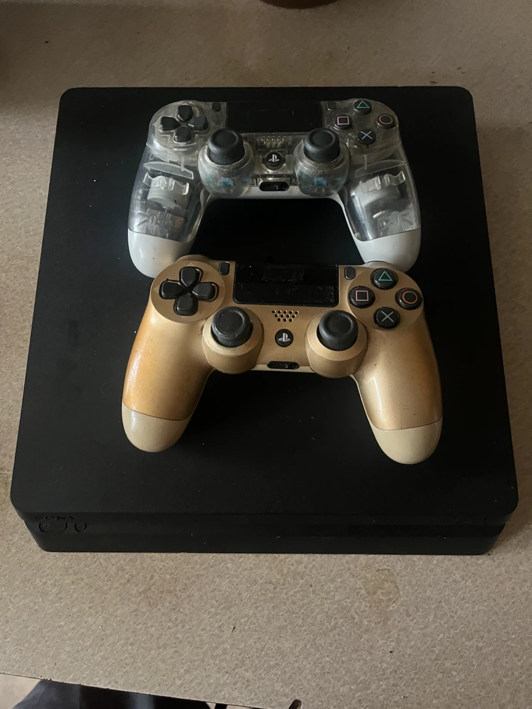Sony PlayStation 4 Slim with Two Controllers