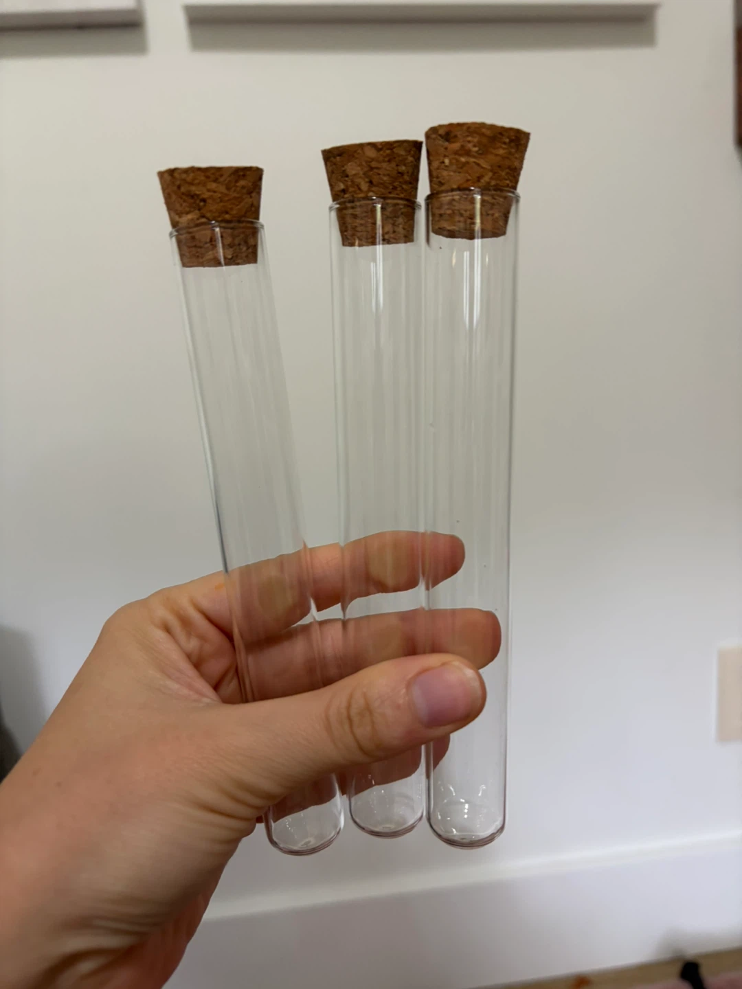 Set of 17 glass test tubes with cork stoppers