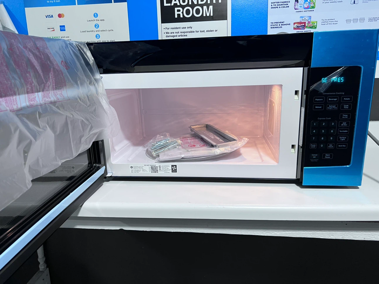 GE Over-the-Range Microwave - photo 2