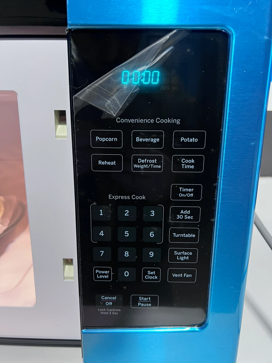 GE Over-the-Range Microwave - photo 3