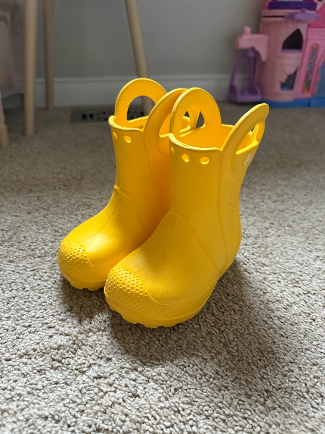 Yellow Crocs rain boots