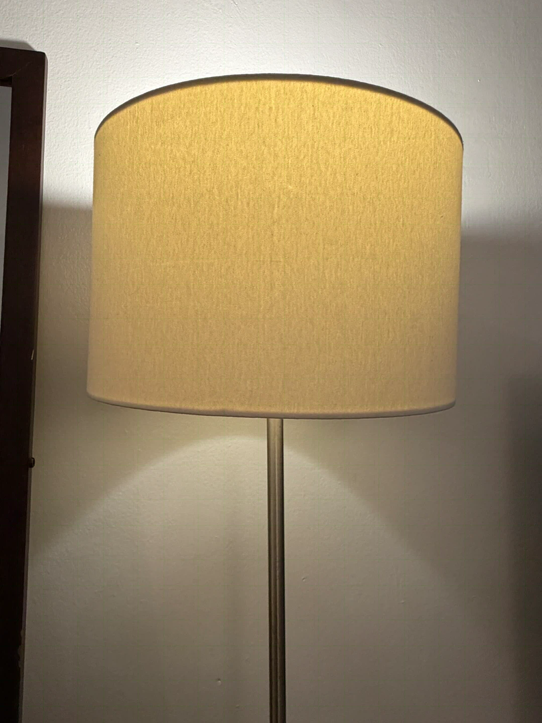 Floor lamp with beige fabric shade