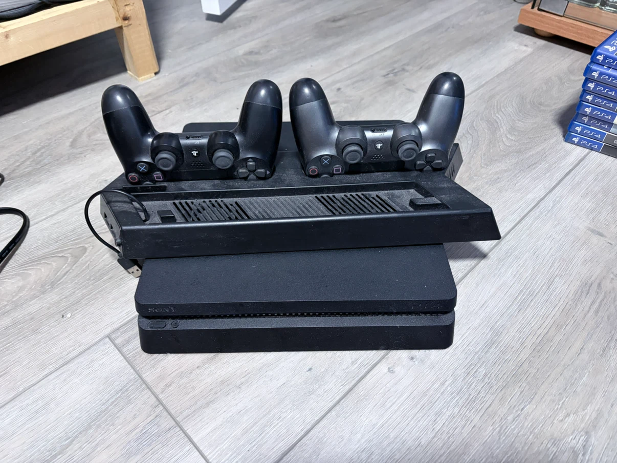 PlayStation 4 Console with 2 Controllers and 8 Games