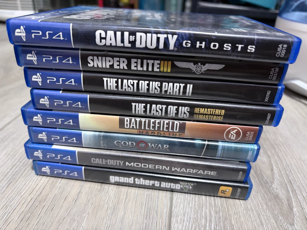 PlayStation 4 Console with 2 Controllers and 8 Games - photo 2
