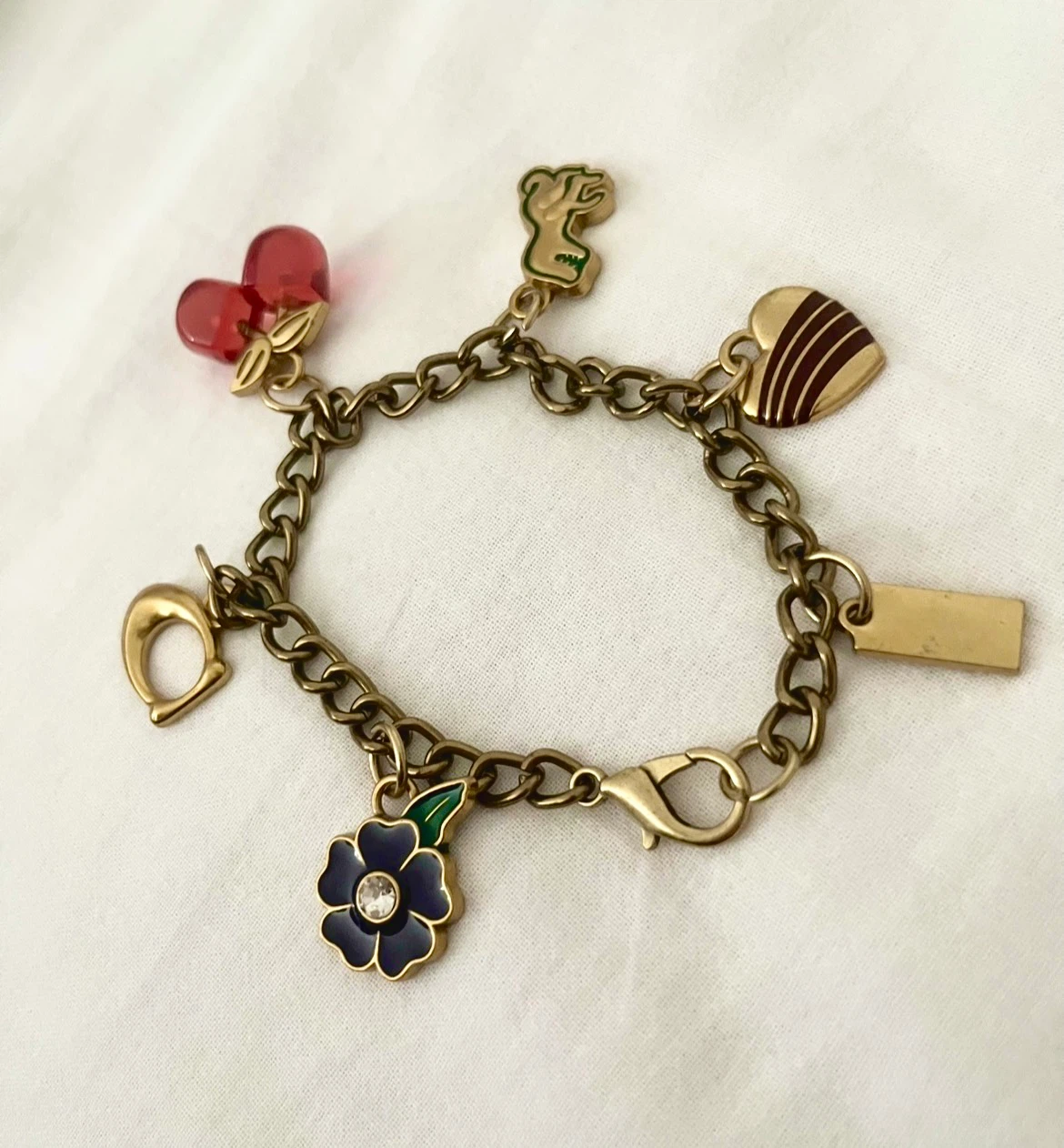 Coach-inspired Multi-Charm Gold Tone Bracelet
