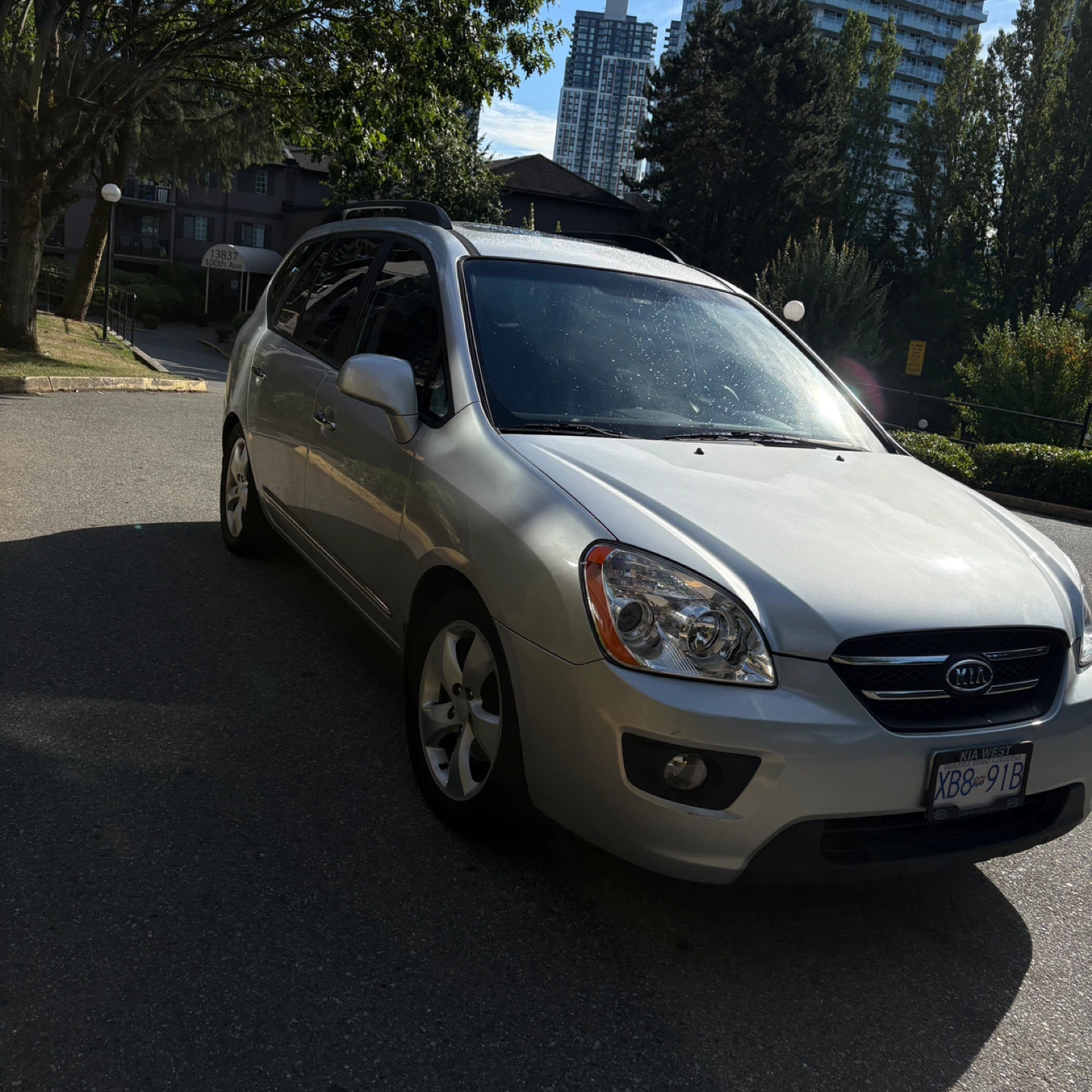 Silver Kia Rondo EX