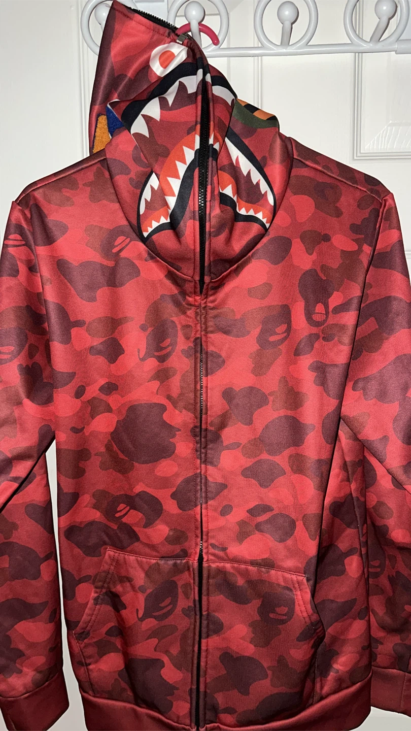 A Bape Red Camo slickly made Shark Hoodie