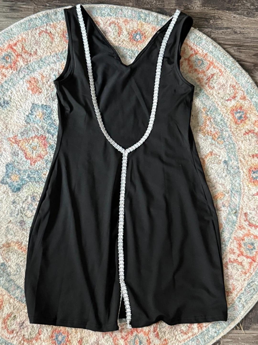 Black sleeveless mini dress with lace trim - photo 2