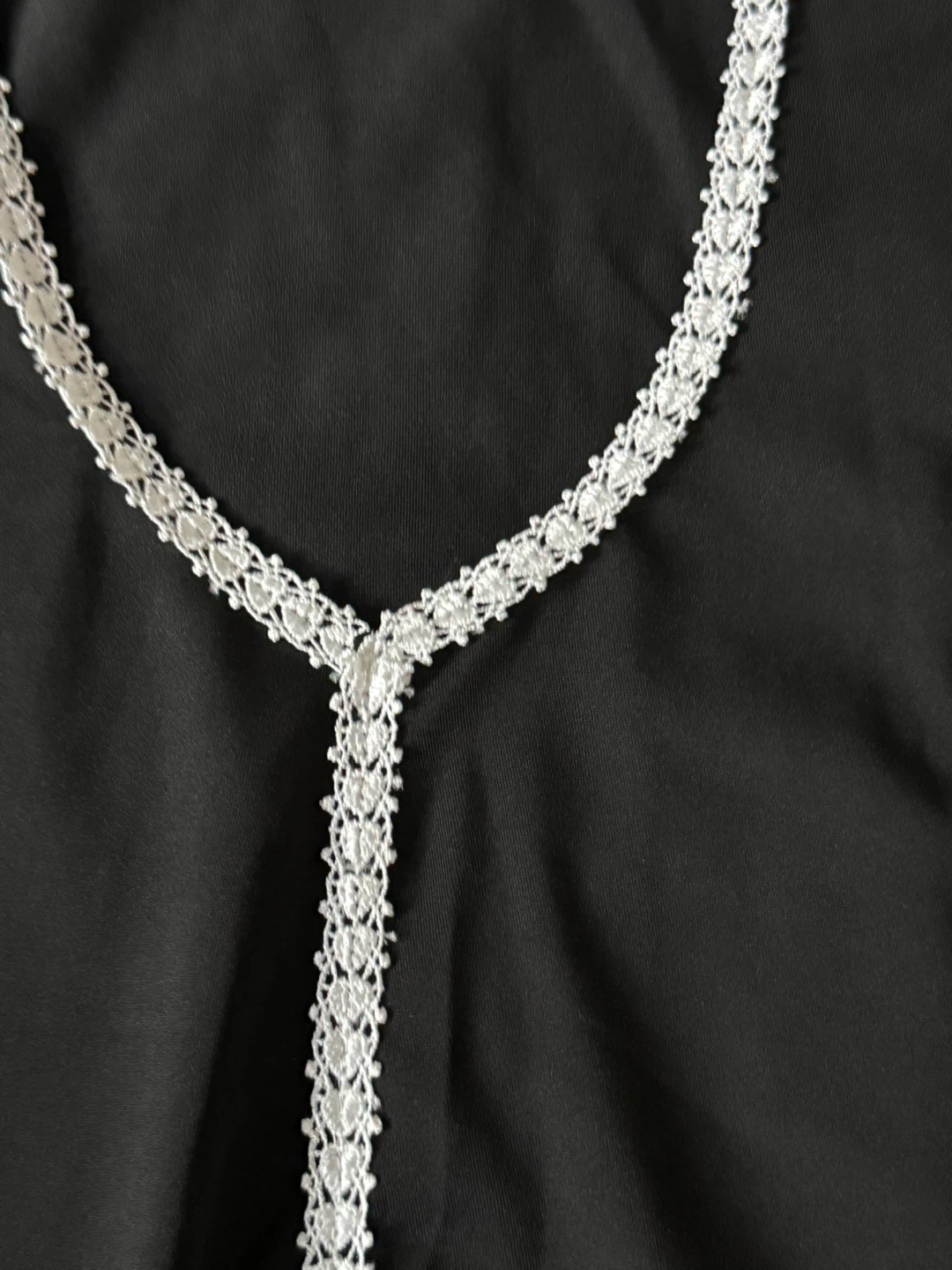 Black sleeveless mini dress with lace trim - photo 3