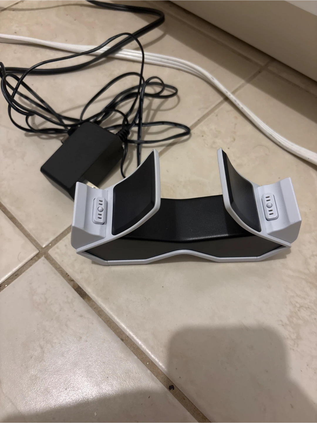 Dual sense charging station