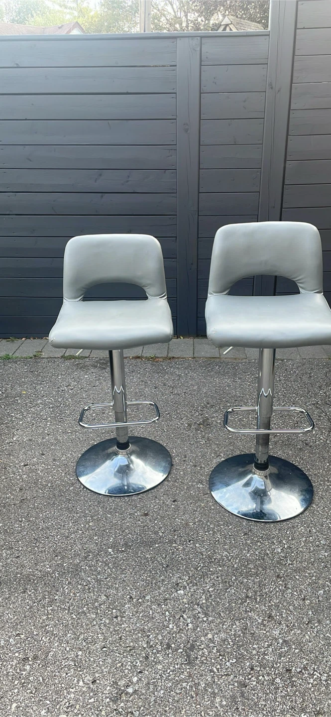 Set of two grey faux leather bar stools