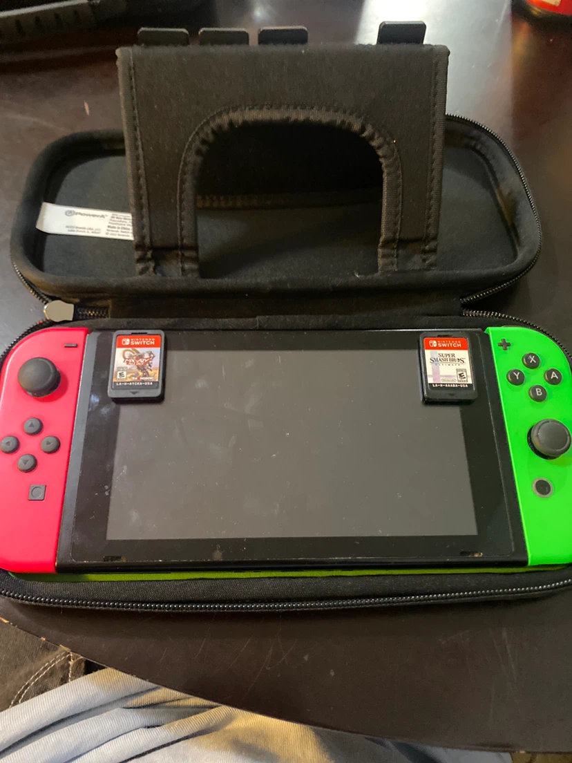 Nintendo Switch Console with Joy-Cons and Games