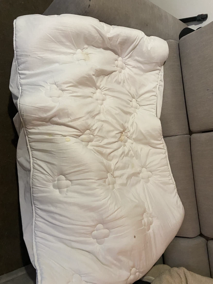 White quilted mattress topper
