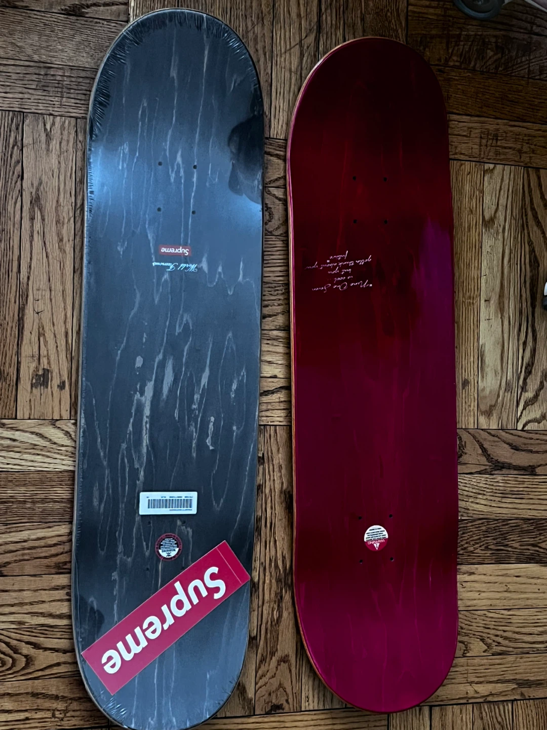 Two Supreme Skateboard Decks