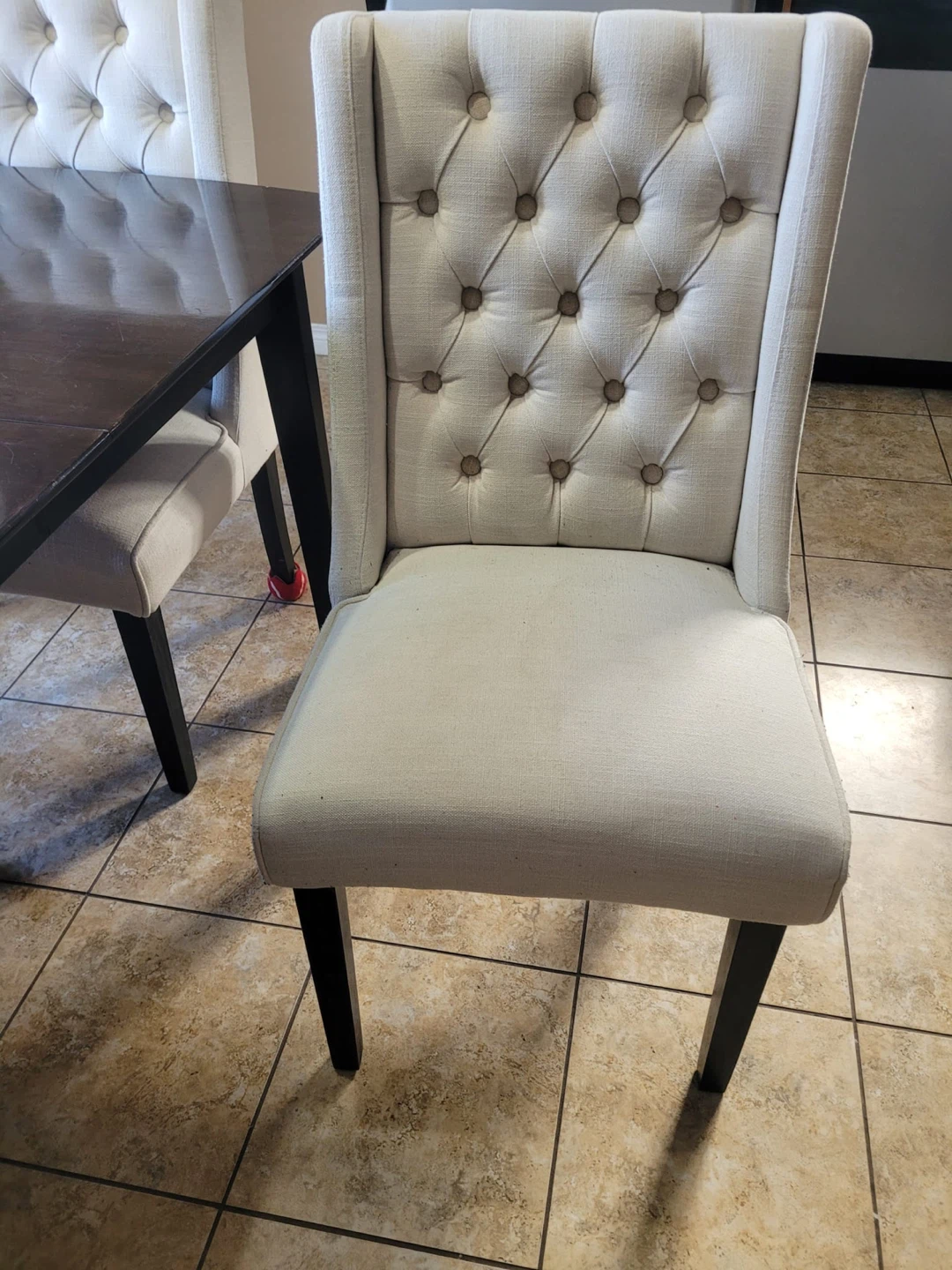 Set of 4 tufted dining chairs, table not included.