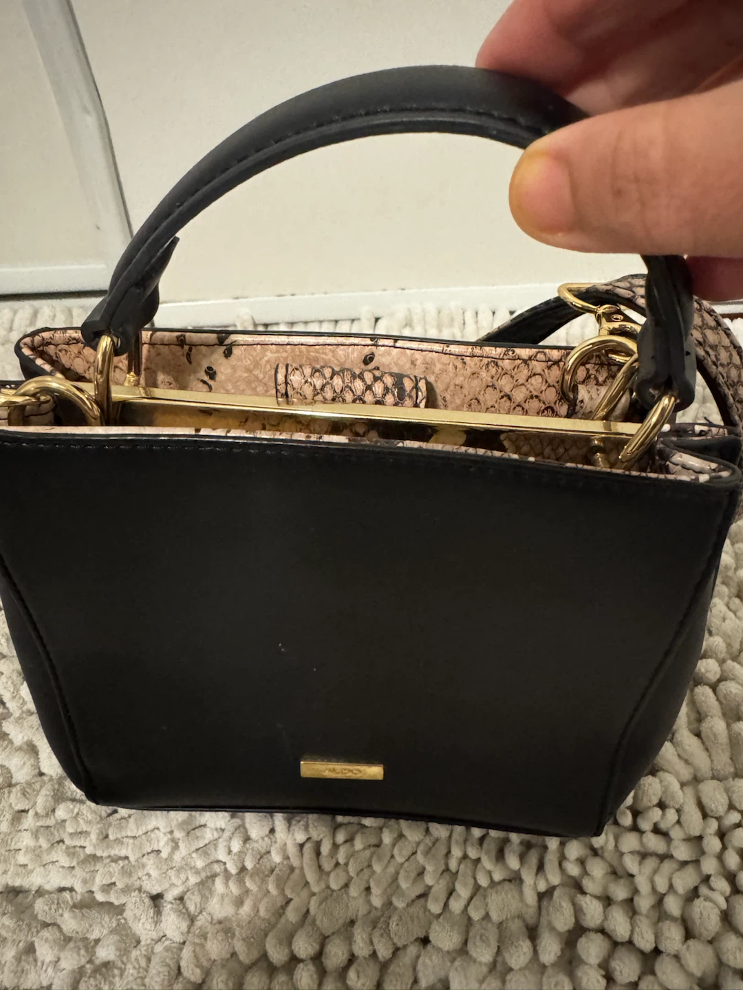 ALDO black handbag with snake print details