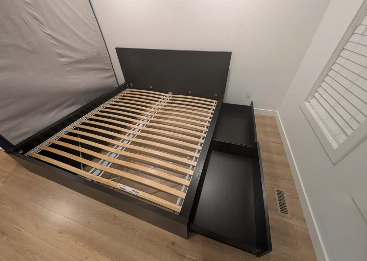 IKEA King bed frame with 4 storage drawers