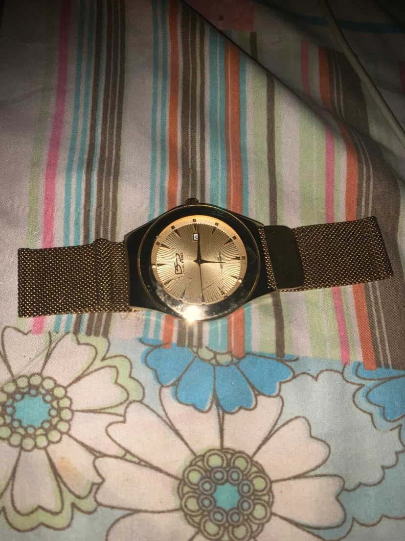 Gold tone Daniel Steiger watch - photo 5