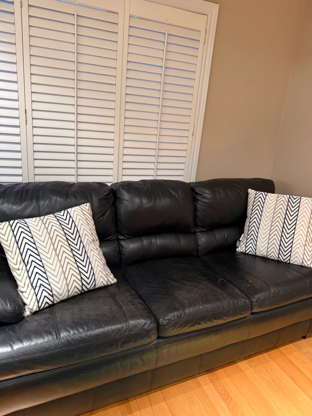 Black Leather Three-Seater Sofa