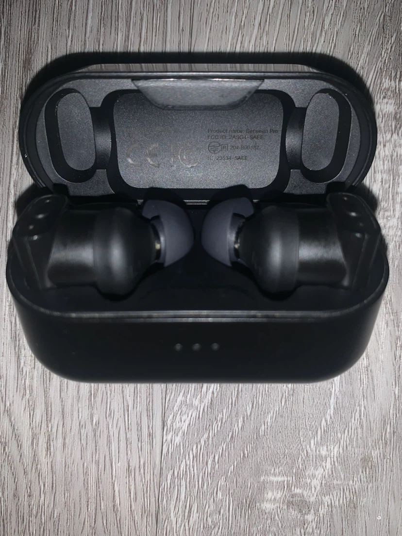 Status Between Pro Wireless Earbuds