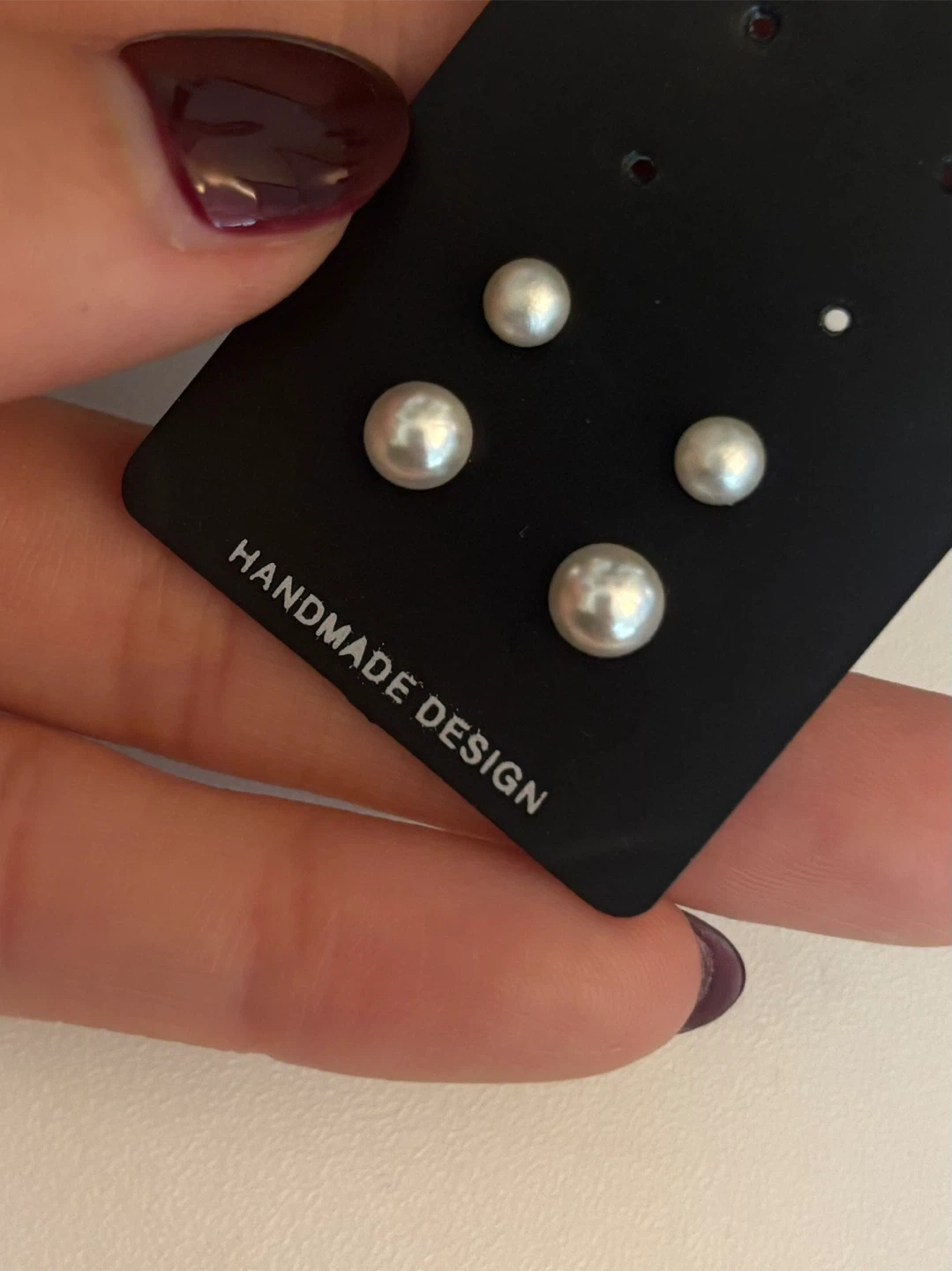 Set of two pairs of faux pearl stud earrings