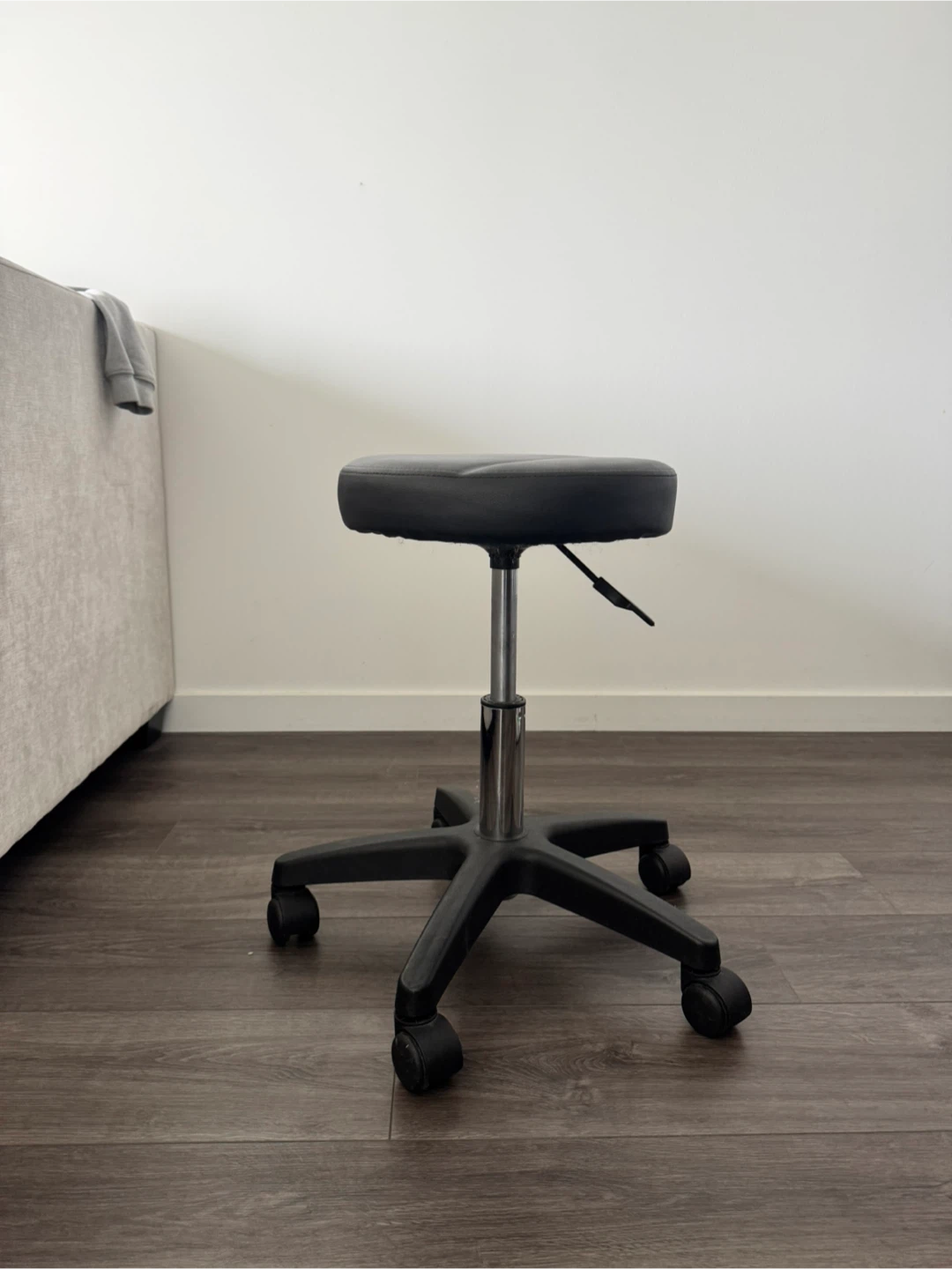 Black Rolling Swivel Stool