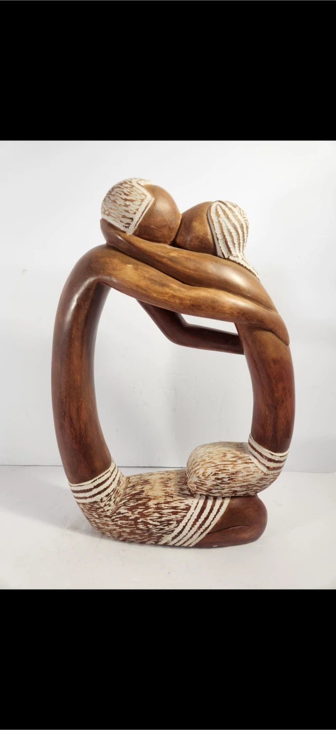 Hand-carved wooden embracing couple sculpture - photo 2