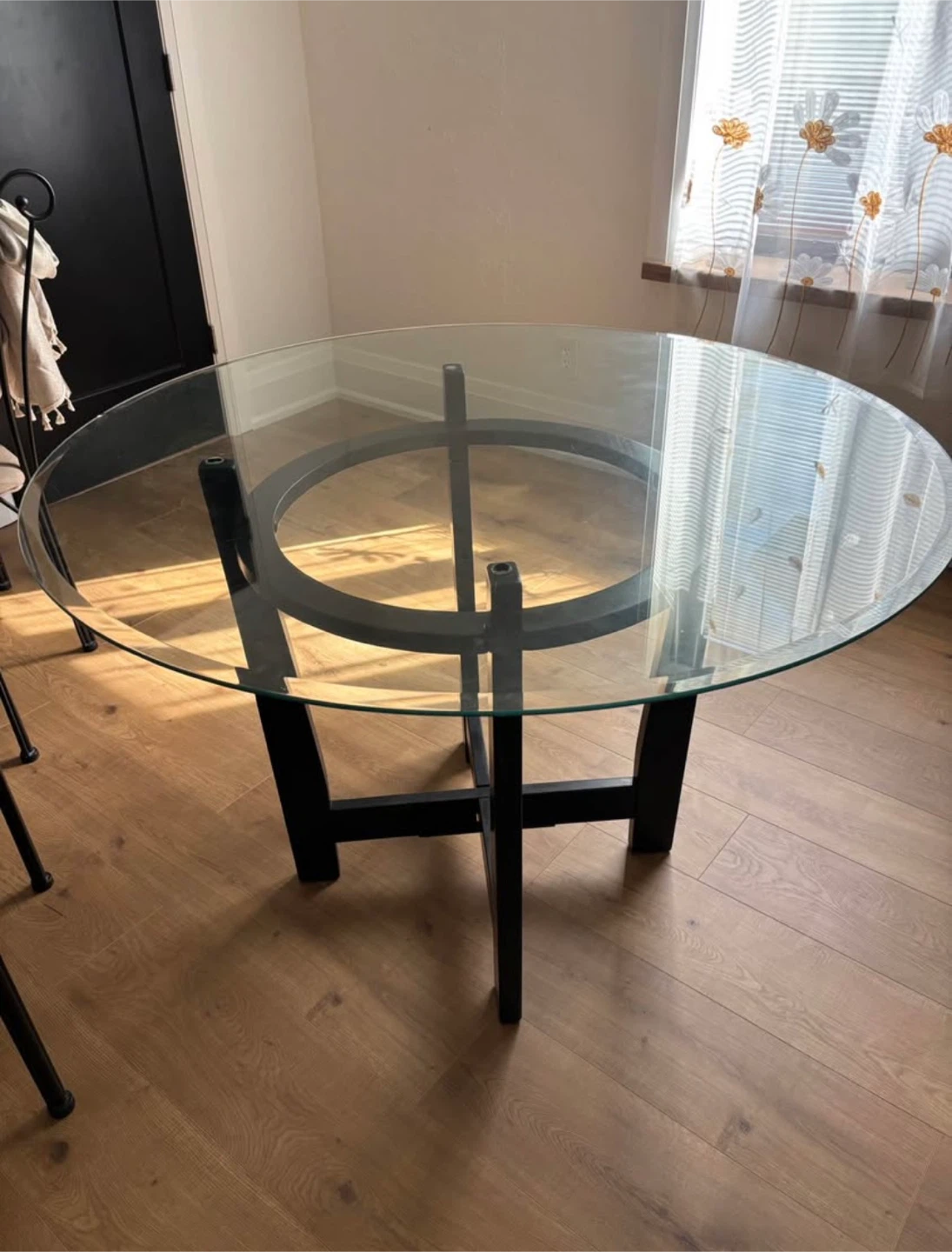 Round Glass Dining Table with Black Metal Base