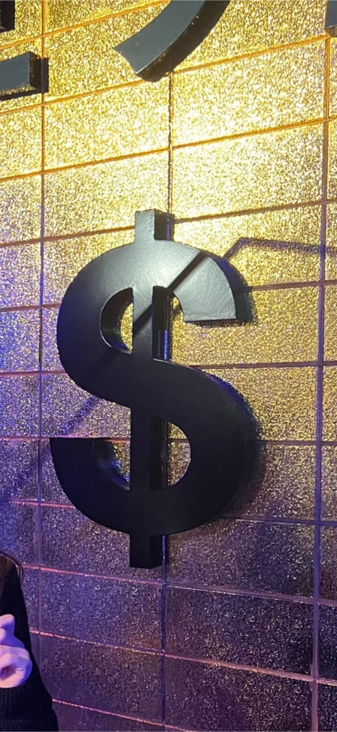 Black Metal Dollar Sign Wall Decor