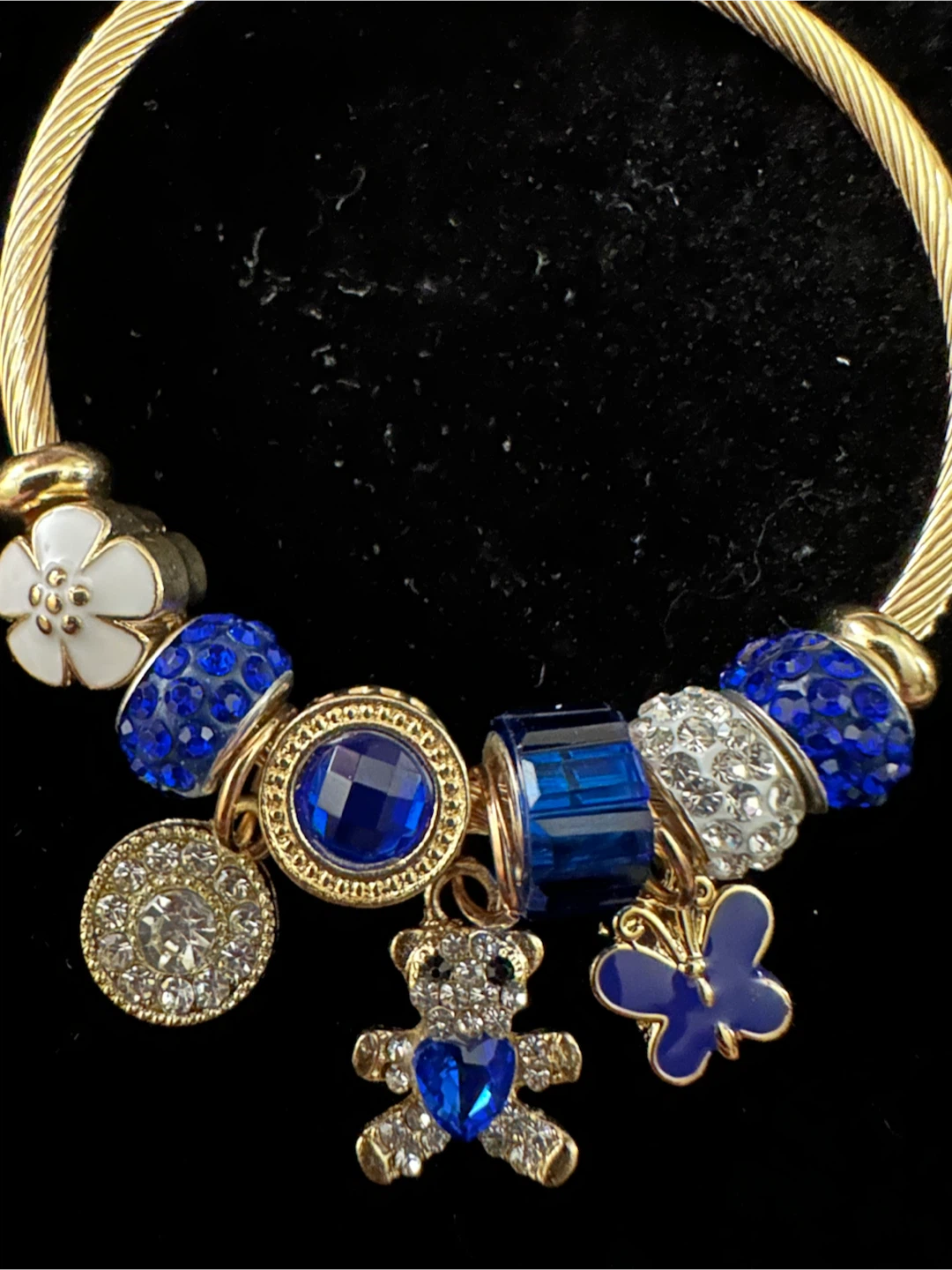 Gold-Tone Charm Bracelet with Blue Accents