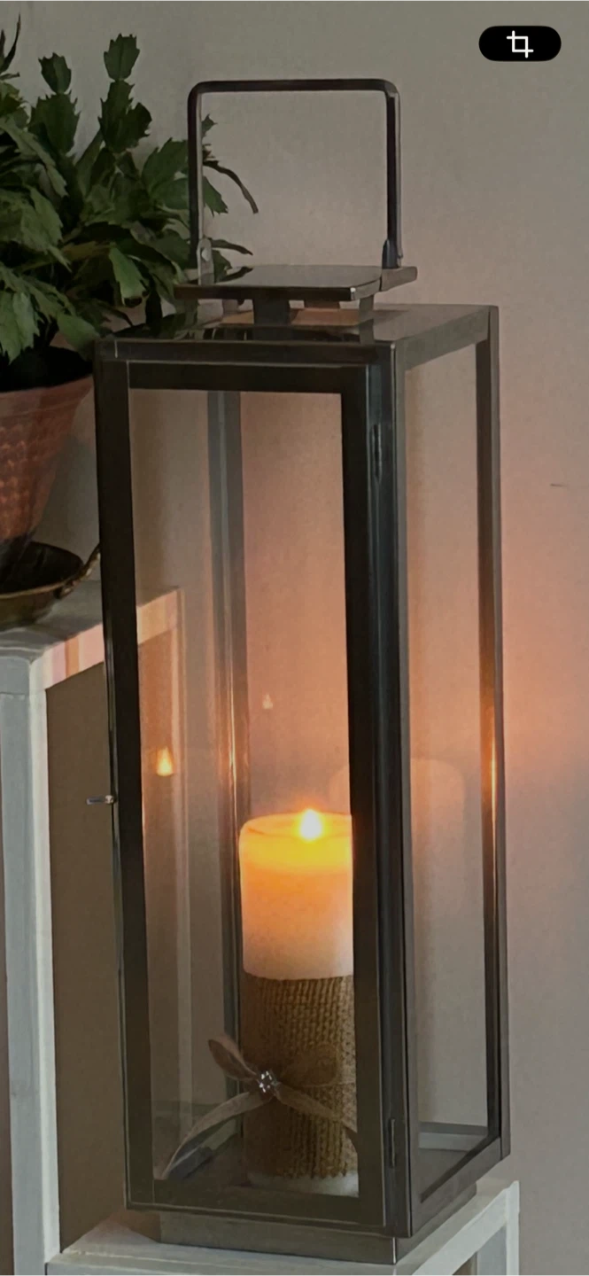 Metal and glass candle lantern