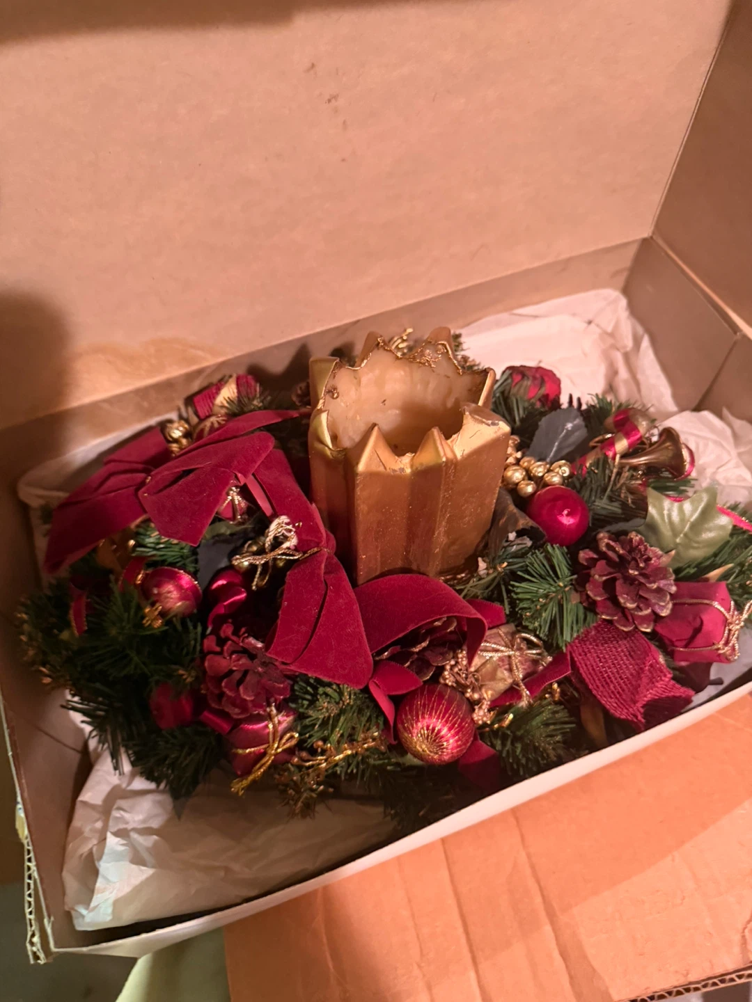Christmas decorative basket and candle centrepiece