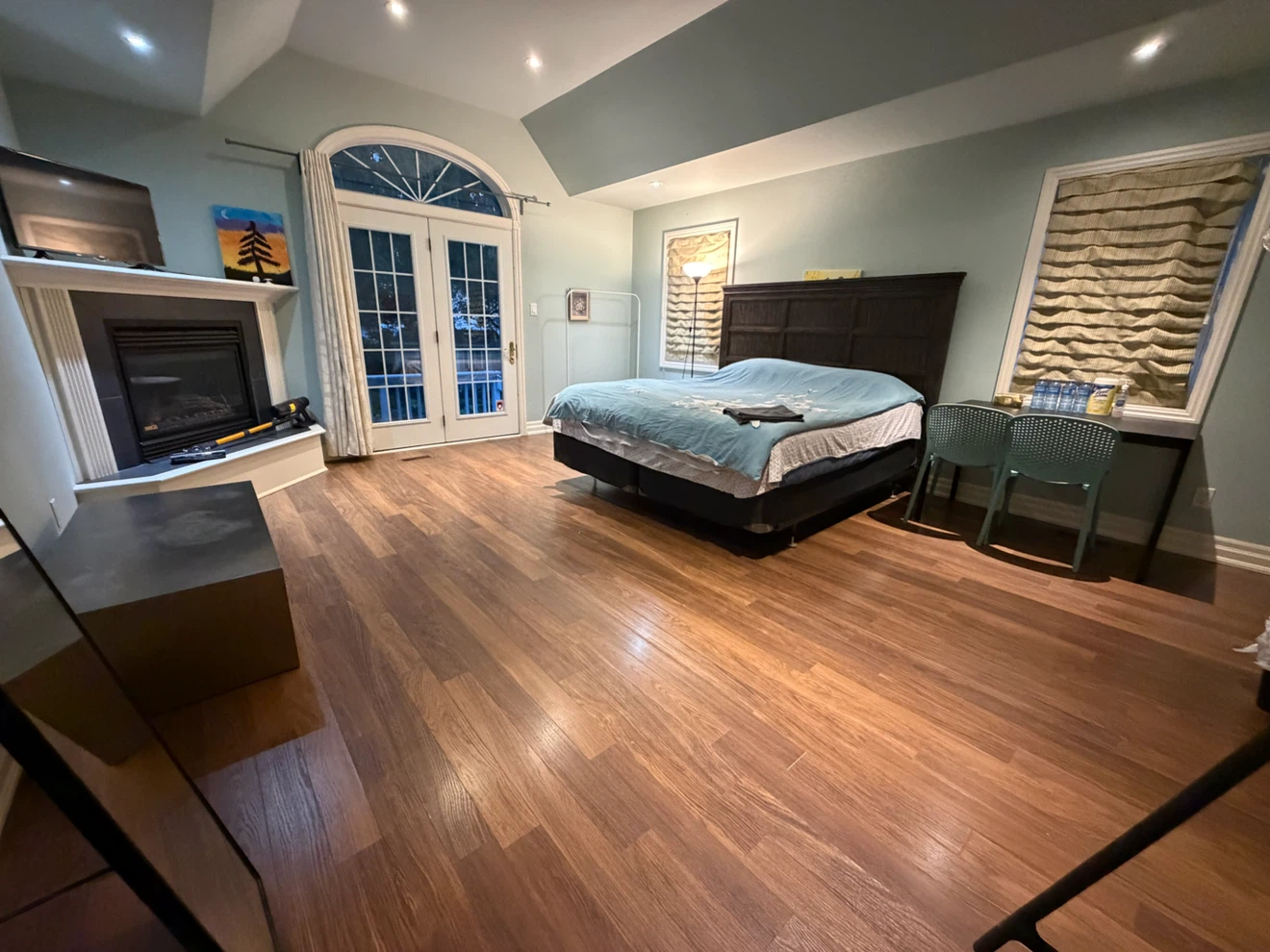 King Size Bed with Dark Wood Headboard