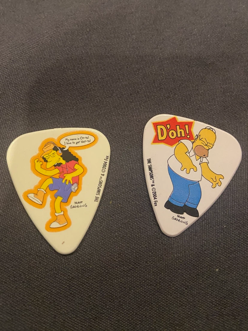 Two The Simpsons Guitar Picks