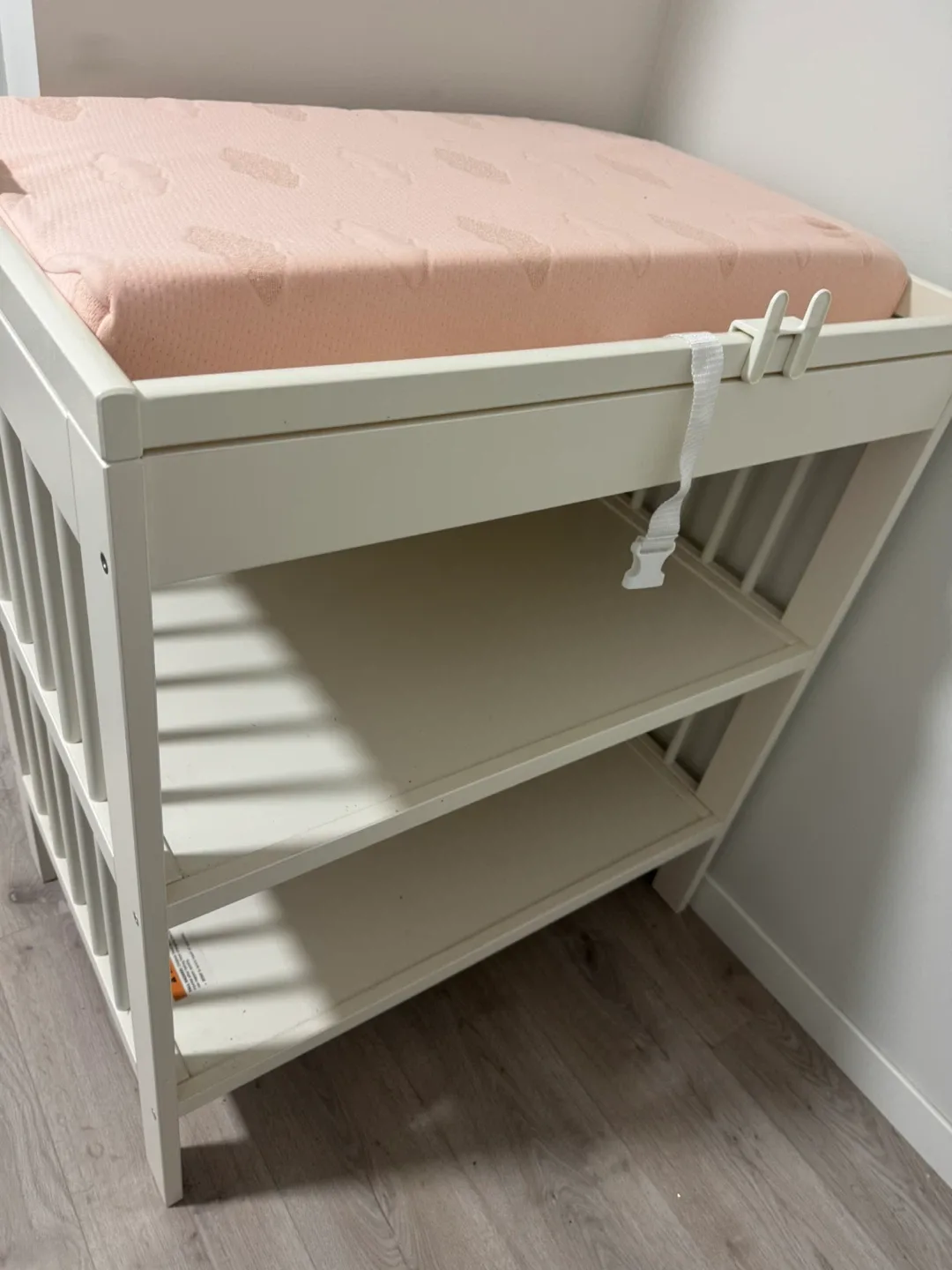 White Baby Changing Table with Pink Pad