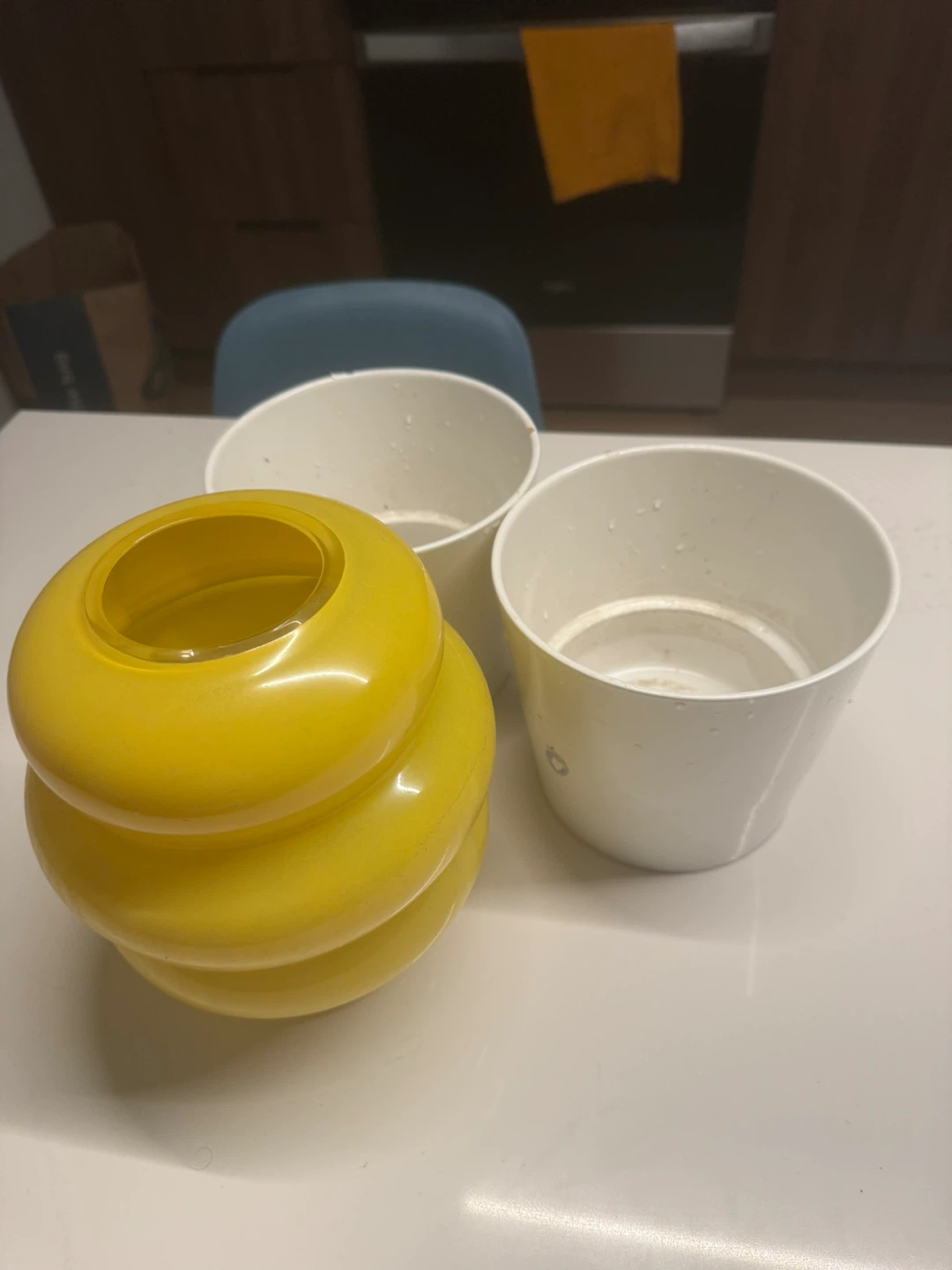 Yellow Glass Vase and Two White Planters