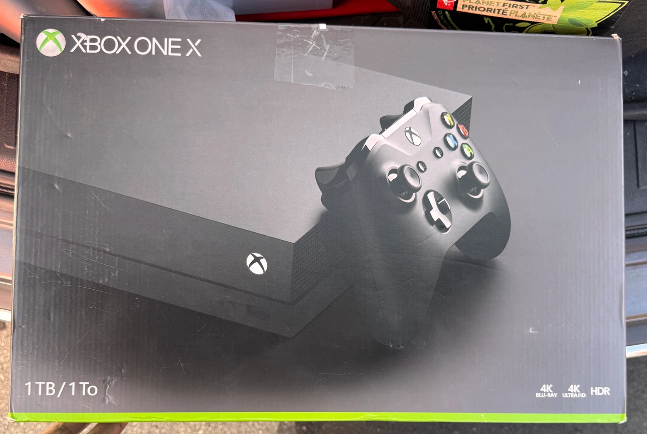Xbox one X 1 TB - like new in box