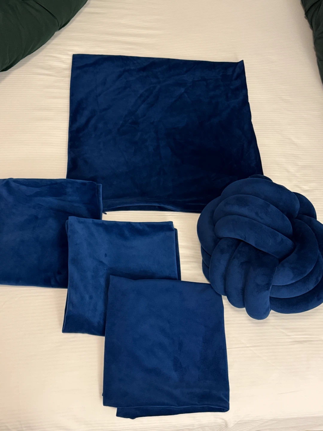 Set of Blue Velvet Cushion Covers and Knot Pillow