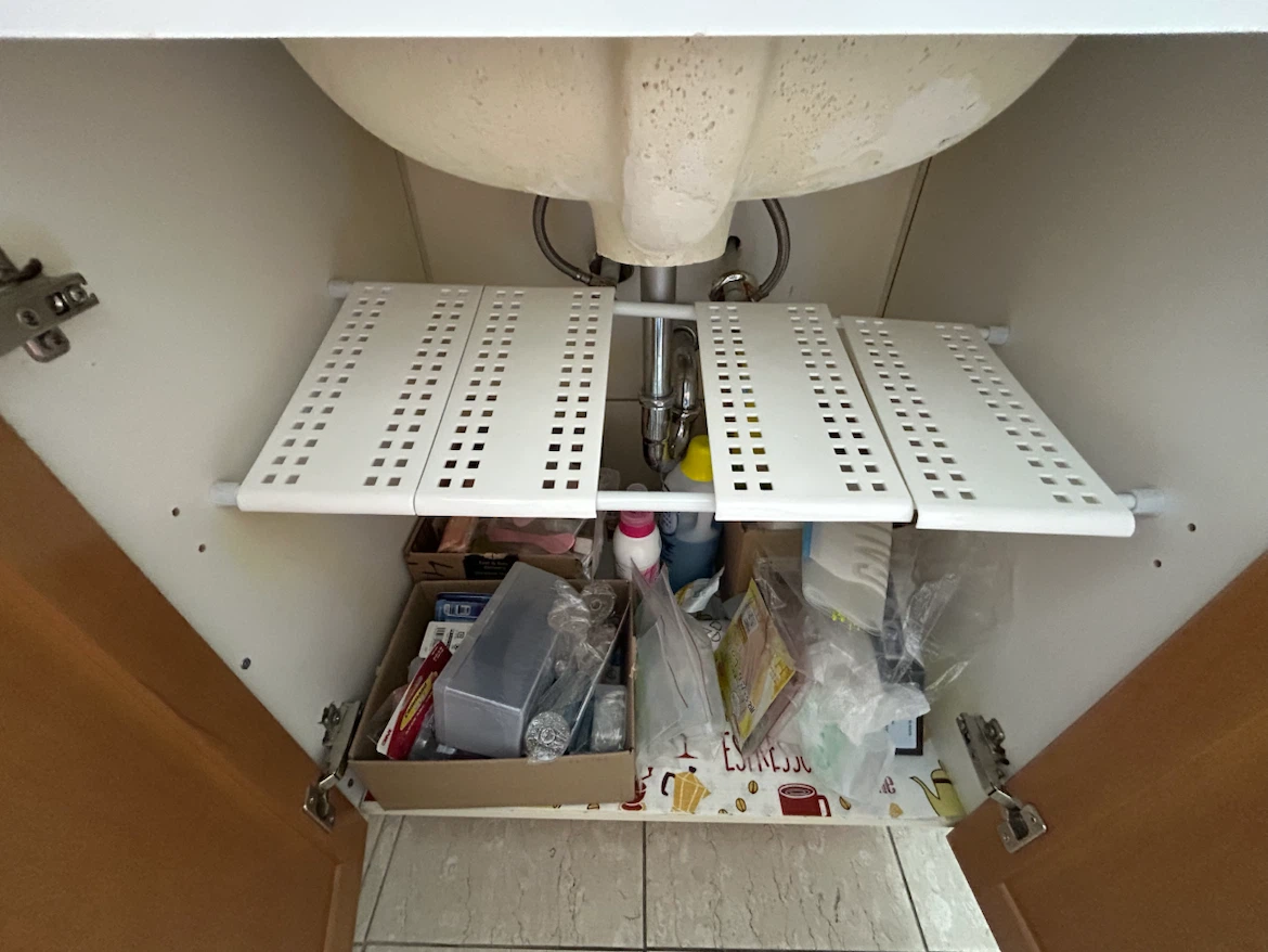 Adjustable Under-Sink Storage Shelf