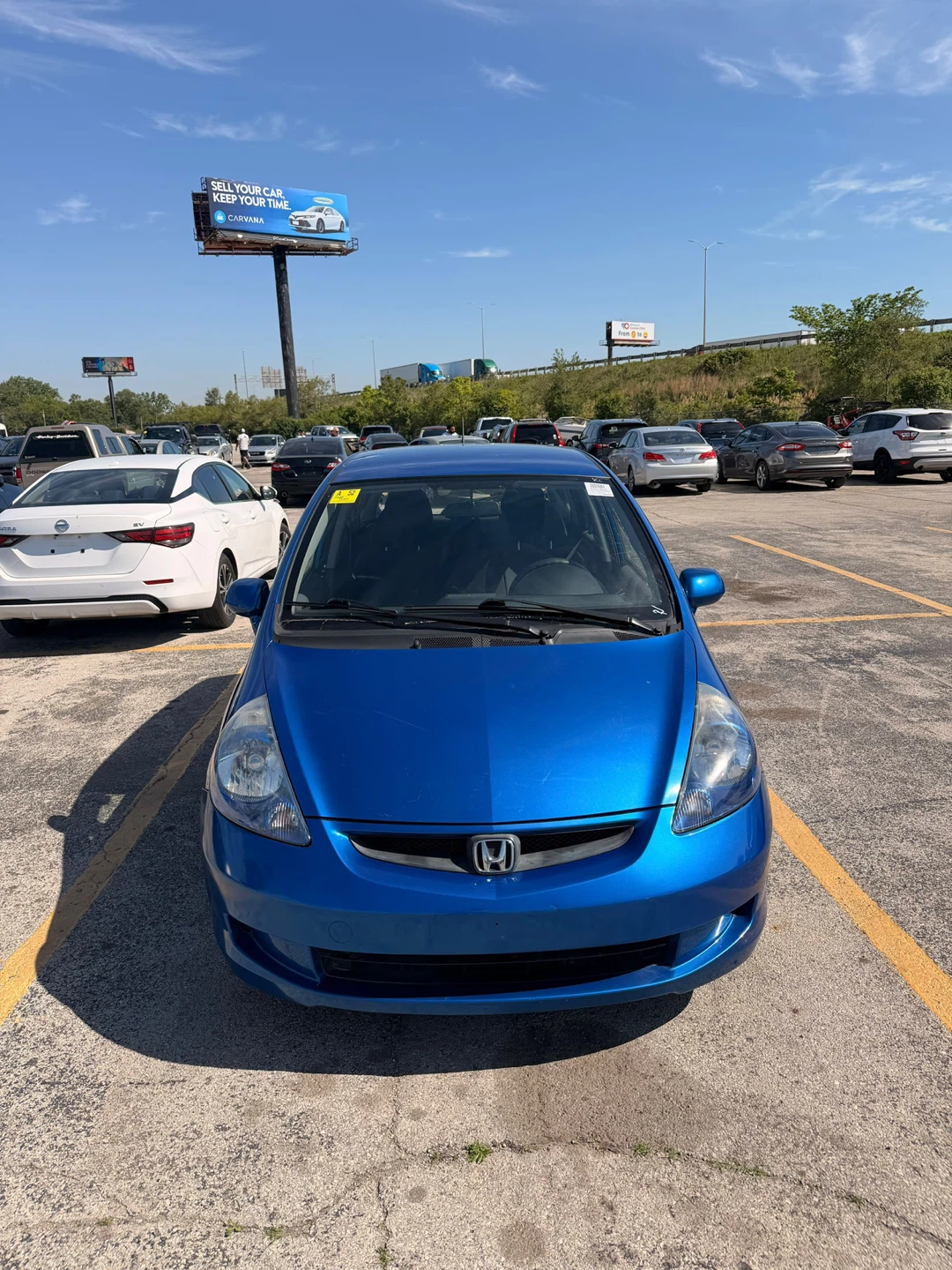 Blue Honda Fit Hatchback