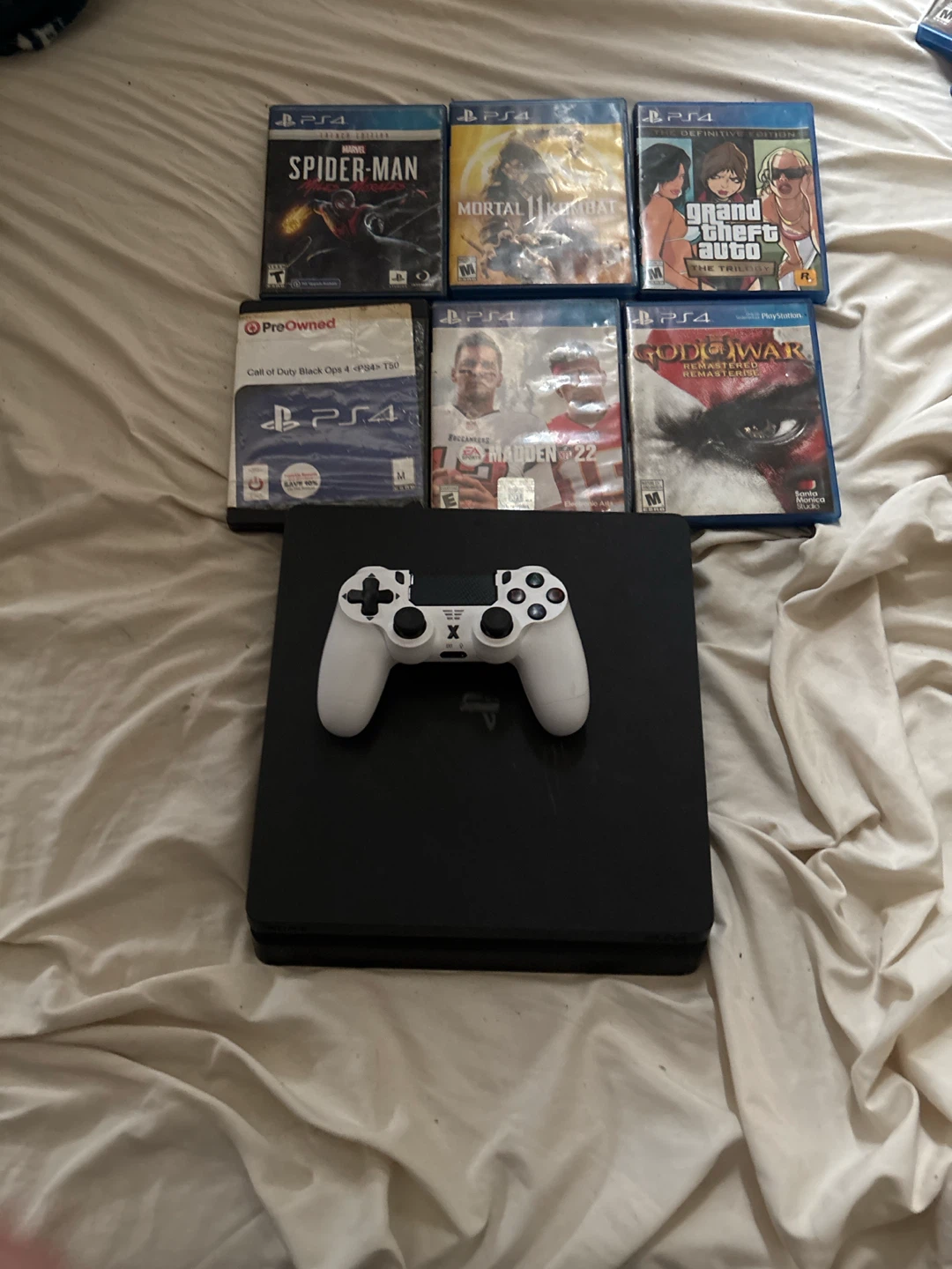 Sony PlayStation 4 Console with Games and Controller