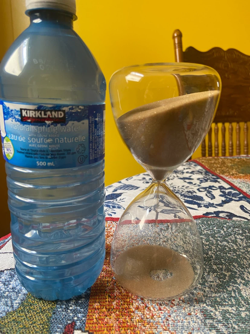 Glass hourglass with brownish sand - photo 2
