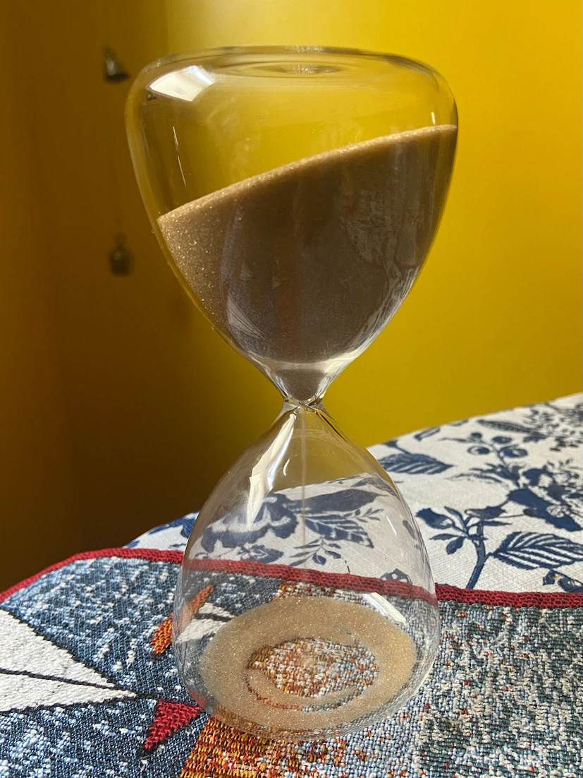 Glass hourglass with brownish sand - photo 3